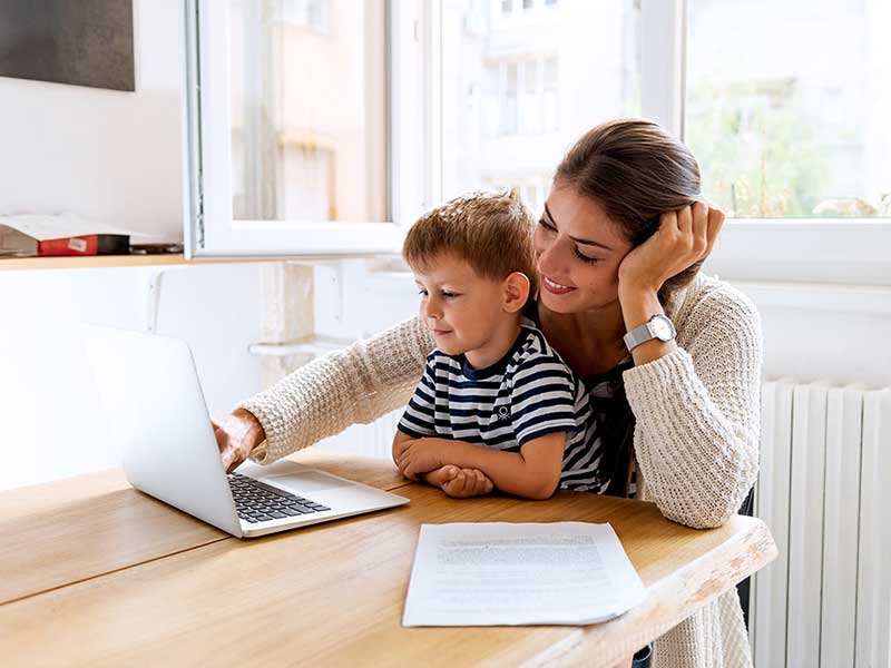 Mother and son on laptop | Barley Automotive in Sainte Genevieve MO